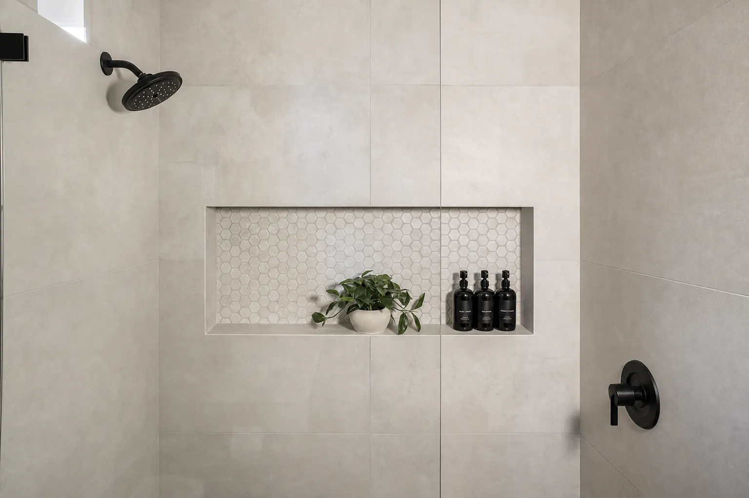 Tiled shower niche with recessed shelf